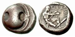 Greek Coins Boeotia, Thebes Stater circa 450-440, AR 12.04 g. Beotian shield. Rev. ℵ?ΕΒΑ − ΙΟΝ ??Heracles kneeling r., stringing bow held in his r. hand; in field r., club. The whole within incuse squ