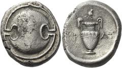 Greek Coins Greek Coins. Thebes. Stater circa 363-338, AR 11.94 g. Boeotian shield. Rev. Amphora; in field, KP – AT and above, helmet. All within incuse area. Hepworth 73. BCD Boiotia 573. Surface som