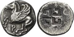 Greek Coins Greek Coins. Corinthia, Corinth. Stater circa 545-500, AR 8.41 g. Bridled Pegasus flying l.; below, koppa. Rev. Quadripartite incuse square with projections in each quarter. Ravel 71-72. C