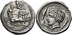 Greek Coins Sicily, Catana. Drachm in the style of Procles circa 405, AR 4.20 g. Fast quadriga driven r. by charioteer, holding kentron and reins; above, Nike flying l. to crown her. Double exergual l