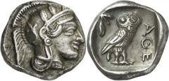 Attique Athènes. Drachme vers 420 av. J.-C. 4,25g. Tête d’Athéna casquée à droite, le casque décoré de feuilles d’olivier / Chouette debout à droite, regardant de face; en haut à gauche, un rameau d’o