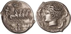 Italy. Sicily, Syracuse. Tetradrachm, c. 405 BC, by Euth [ydamos] and Eumenes. (Silver, 17.28g., 24.8mm). Quadriga galloping to right, driven by a winged male figure holding the reins with both hands;