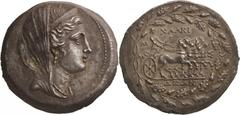 Central Greece. Euboia, Chalkis. Tetradrachm, c. 170 BC. (Silver, 16.94g., 31.3mm). Veiled head of Hera to right, wearing stephane, pendant earring and pearl necklace / ΧΑΛΚΙΔΕΩΝ Hera standing right, 