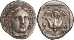 Asia Minor. Islands off Caria, Rhodos. Rhodes, Tetradrachm, c. 404 - 385 BC. (Silver, 15.26g., 25.7mm). Head of Helios facing, turned slightly to the right / ΡΟΔΙΟΝ Rose with bud to left; to left, Φ; 
