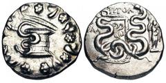 LYDIA, Tralles. After 133 BC. AR Cistophoric Tetradrachm (12.26 gm), year 3 (131 BC). Cysta Mystica / Two serpents coiled around bow-case, to right Dionysos standing leaning on thyrsos and holding mas