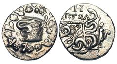 LYDIA, Tralles. After 133 BC. AR Cistophoric Tetradrachm (12.33 gm), year 8 (126 BC). Cysta Mystica / Two serpents coiled around bow-case, to right Dionysos standing leaning on thyrsos and holding mas