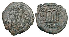 BYZANTINE EMPIRE. Tiberios II Constantine, 578-582 AD. Æ Follis (13.04 gm) of Constantinople, yr. 6 A. Consular bust facing / Large M. S.430. VF, brown patina.
