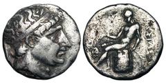 BAKTRIAN KINGDOM. Antiochos I, 280-261 BC. AR Tetradrachm (16.26 gm). Diademed head / Apollo seated on omphalos, Delta in circle in field. ANS.54. SC.438.1a. Toned aVF. Scarce. [Est. $500]
