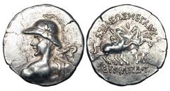 BAKTRIAN KINGDOM. Eukratides, 170-145 BC. AR Tetradrachm (16.94 gm). Helmeted heroic bust wielding spear / The Dioscuri riding holding palms. SNG.ANS.484/469. Toned VF+. Interesting Eastern style with
