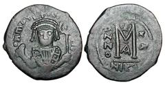 BYZANTINE EMPIRE. Maurice Tiberius, 582-602 AD. Æ Follis (12.54 gm) of Nikomedia, yr. 20. Bust facing in consular robes / Large M, christogram above. S.513. VF, olive brown patina. Scarce. ex Khristno