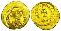 BYZANTINE EMPIRE. Phokas, 602-610 AD. Gold Tremissis (1.45 gm) of Constantinople. Diademed bust / Cross potent. S.633. XF+. [Est. $450]