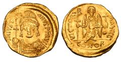 BYZANTINE EMPIRE. Justinian I, 527-565 AD. Gold Solidus (4.20 gm) of Constantinople. Crowned bust facing / Angel standing, facing. S.140. VF+.
