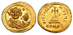 BYZANTINE EMPIRE. Heraklios, 610-641 AD. Gold Solidus (4.39 gm) of Constantinople. Crowned busts of emperor & son facing / Cross on three steps. S.739. Near Mint.