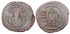 Byzantine BYZANTINE EMPIRE. Tiberius II, Constantine, 578-582 AD. AE Follis (17.59 gm) of Constantinople, yr.4, off, D. Crowned bust facing / Large M. S.430. aVF, brown patina, bend in planchet.