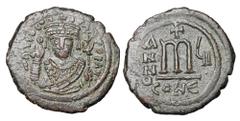 Byzantine Coins BYZANTINE EMPIRE. Tiberius II, Constantine, 578-582 AD. Æ Follis (13.38 gm) of Constantinople, yr.6, off, E. Crowned bust facing / Large M. S.430. VF+, earthy brown patina. ex Hoffman 