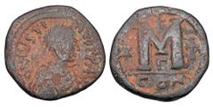 Byzantine BYZANTINE EMPIRE. Justin I, 518-527 AD. AE Follis (17.45 gm) of Constantinople. Diademed bust right / Large M. S.63. VF, earthy brown patina. Scarce.