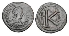 Byzantine Coins BYZANTINE EMPIRE. Anastasius I, 491-518 AD. Æ Half Follis (10.47 gm) of Constantinople. Diademed draped bust / Large K with Latin cross. S.25. VF, green patina. ex Hoffman collection.