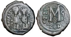Byzantine BYZANTINE EMPIRE. Justin II, 565-578 AD. AE Follis (13.81 gm) of Constantinople, yr.8, off. B. Justin and Sophia enthroned facing / Large M, Cross above. S.360. VF, brown patina.