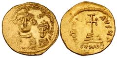 Byzantine BYZANTINE EMPIRE. Heraklios, 610-641 AD. Gold Solidus (4.47 gm) of Constantinople. Crowned facing busts of emperor & son / Cross on four steps. S.734. aXF, o/c. trace of graffiti.