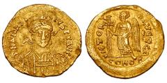 Byzantine Coins BYZANTINE EMPIRE. Anastasios I, 491-518 AD. Gold Solidus (4.53 gm) of Constantinople. Helmeted bust 3/4 facing right / Angel standing left. S.5. VF+. Scarce.