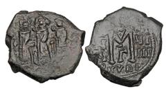 Byzantine Coins BYZANTINE EMPIRE. Heraklios, 610-641 AD. Æ Follis (6.30 gm) of Cyprus. Emperor standing between empress & son / Large M. S.849. Uneven VF+, dark green patina. Scarce.