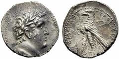 Judaea, Tetradrachm,c. 120-30 BC, AR, (g 14,20, mm 28, h 1). Laureate bust of Melquart r.; around border of dots, Rv. TYPOY IEPAΣ KAI AΣYΛOY, eagle standing l. on prow; at l. club, behind palm-tree. H