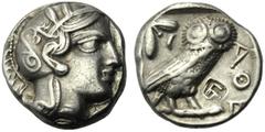 Monete greche / Greek Coins Attica, Tetradramma, Atene, c. 449-404 a.C., AR, (g 17,08, mm 24, h 9). Testa di Atena a d., indossa elmo Attico decorato da tre foglie d’ulivo e da una palmetta, Rv. AΘE, 