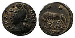 Monete romane imperiali / The Roman Empire Costantino I (306-337), Nummus, Treviri, AE, (g 2,17, mm 16, h 12). Testa elmata di Roma a s., Rv. La lupa allatta i gemelli. RIC 547. Tracce di argentatura.