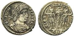 Monete romane imperiali / The Roman Empire Costante (337-350), Nummus, Siscia, 337-350 d.C., AE, (g 1,80, mm 16, h 6). Busto diademato, corazzato e drappeggiato a D., Rv. Due soldati armati stanti l’u