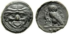 Sicily, Tetras,Kamarina, c. 420-410 BC, AE, (g 3,74, mm 14, h 9). Gorgoneion, Rv. KAMA, owl standing l., holding lizard; in ex. three pellets. CNS III, n.21; SNG ANS 326.Dark patina. Good extremely f