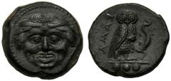 Sicily, Tetras, Kamarina, c. 425-405 BC, AE (g 3,45 mm 14 h 12), Gorgoneion, dotted border, Rv. KAMA, owl standing l., holding lizard with claw in ex., three pellets. CNS III, n. 25 SNG Copenhagen - S