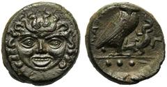 Sicily, Tetras, Kamarina, c. 420-405 BC; AE (g 4,68; mm 15; h 12); Gorgoneion, Rv. KAMA, owl standing r., holding lizard; in ex. three pellets. CNS III, n. 8.About extemely fine / good very fine.