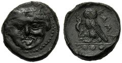 Sicily, Tetras, Kamarina, c. 420-405 BC; AE (g 3,08; mm 14; h 9); Gorgoneion, dotted border, Rv. KAMA, owl standing l., holding lizard with claw; in ex. three pellets. CNS III, n. 21; SNG Copenhagen 1