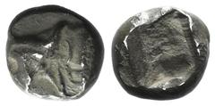Greek world and ancient Near East Ionia, Uncertain, c. 5th century BC. AR Tetartemorion (5mm, 0.14g). Head and neck of bull l. R/ Incuse punch. VF