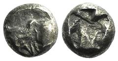 Greek world and ancient Near East Ionia, Uncertain, c. 5th century BC. AR Tetartemorion (6mm, 0.20g). Head and neck of bull l. R/ Incuse punch. VF