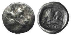 Greek world and ancient Near East Asia Minor, Uncertain, c. 5th century BC. AR Tetartemorion (6mm, 0.18g). Head r. (?). R/ Horse's head r. Not found in the standard references. VF