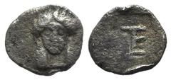 Greek world and ancient Near East Ionia, Kolophon, c. 450-410 BC. AR Tetartemorion (7mm, 0.26g, 6h). Facing head of Apollo. R/ TE monogram (mark of value) within incuse rectangle. Milne, Colophon 7; S