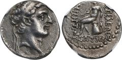 SYRIA. Seleukid Kingdom. Demetrios I Soter, 162-150 B.C. AR Drachm, Ecbatana Mint. NGC Ch VF. HGC-9, 803; cf. SC-1736. Obverse: Diademed head right; Reverse: Apollo seated left on omphalos, resting ha