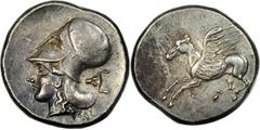 GREEK Corinth CORINTHIA. Corinth. AR Stater (8.65 gms), ca. 405-345 B.C. Cal-210/1. Pegasus flying left, no koppa below; Reverse: Helmeted Athena left, bull head behind. Silvery iridescence, light obv