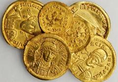 ROMAN EMPIRE ROMAN EMPIRE. Grouping of Late Roman Gold. 6 pieces in lot. Includes Solidus of Valentenian, Constantius II, Marcian, Zeno, as well as Tremissis of Leo I and Anastasius. Some have minor d