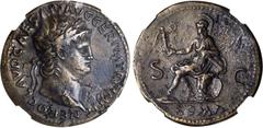 NERO, A.D. 54-68. AE Sestertius (25.53 gms), Lugdunum Mint, ca. A.D. 65. RIC-398. "NERO CLAVD CAESAR AVG GER P M TR P IMP P P" Laureate bust of Nero right, globe at point of neck; Reverse: Roma helmet