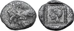 Greek Karia, uncertain mint (Mint G) AR 1/16 Stater. Circa 490-470 BC. Aeginetic standard. Forepart of a winged and horned, man-headed monster to left / Head of female to left in dotted square border 