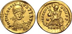 Maritime Theodosius II AV Solidus. Constantinople, AD 441-450. D N THEODOSIVS P F AVG, pearl-diademed, helmeted and cuirassed bust facing slightly to right, holding spear and shield decorated with hor