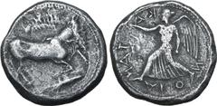 Greek Sicily, Katane AR Tetradrachm. Circa 460 BC. The river god Amenanos as a bearded, man-headed bull swimming to right; branch above, fish below / Nike, wearing long chiton, advancing to left, hold