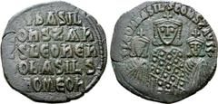 Byzantine Basil I 'the Macedonian', with Constantine and Leo VI Æ 40 Nummi. Constantinople, AD 870-879. + LЄOҺ bASIL COҺST AЧϚϚ, crowned half-length facing busts of Basil, wearing loros, between Leo V