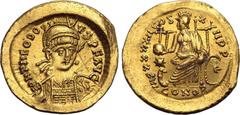 Maritime Theodosius II AV Solidus. Constantinople, AD 441-450. D N THEODOSIVS P F AVG, pearl-diademed, helmeted and cuirassed bust facing slightly to right, holding spear and shield decorated with hor