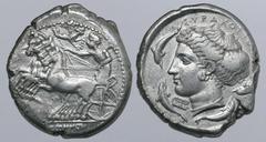 Greek Sicily, Syracuse AR Tetradrachm. Time of the Second Democracy, circa 415-405 BC. Obverse die signed by Eumenes and reverse die signed by Eukleidas. Charioteer, holding kentron in right hand and 