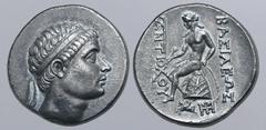 Greek Seleukid Empire, Antiochos Hierax AR Tetradrachm. Lampsakos, circa 246-227 BC. Diademed head to right / Apollo Delphios seated to left on omphalos, holding arrow and bow set on ground; long torc