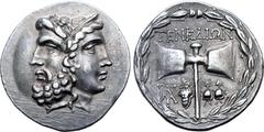 Greek Islands off Troas, Tenedos AR Tetradrachm. Circa 160-70 BC. Janiform head of a laureate bearded male to left and female to right, wearing stephanos / Labrys; TENEΔIΩN above, handle flanked by mo