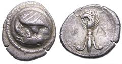 Elis, Olympia AR Stater. 388 BC, struck for the 98th Olympiad. Eagle standing left, grasping the back of a ram with its talons and tearing at its neck with its beak; the whole on round shield with rai